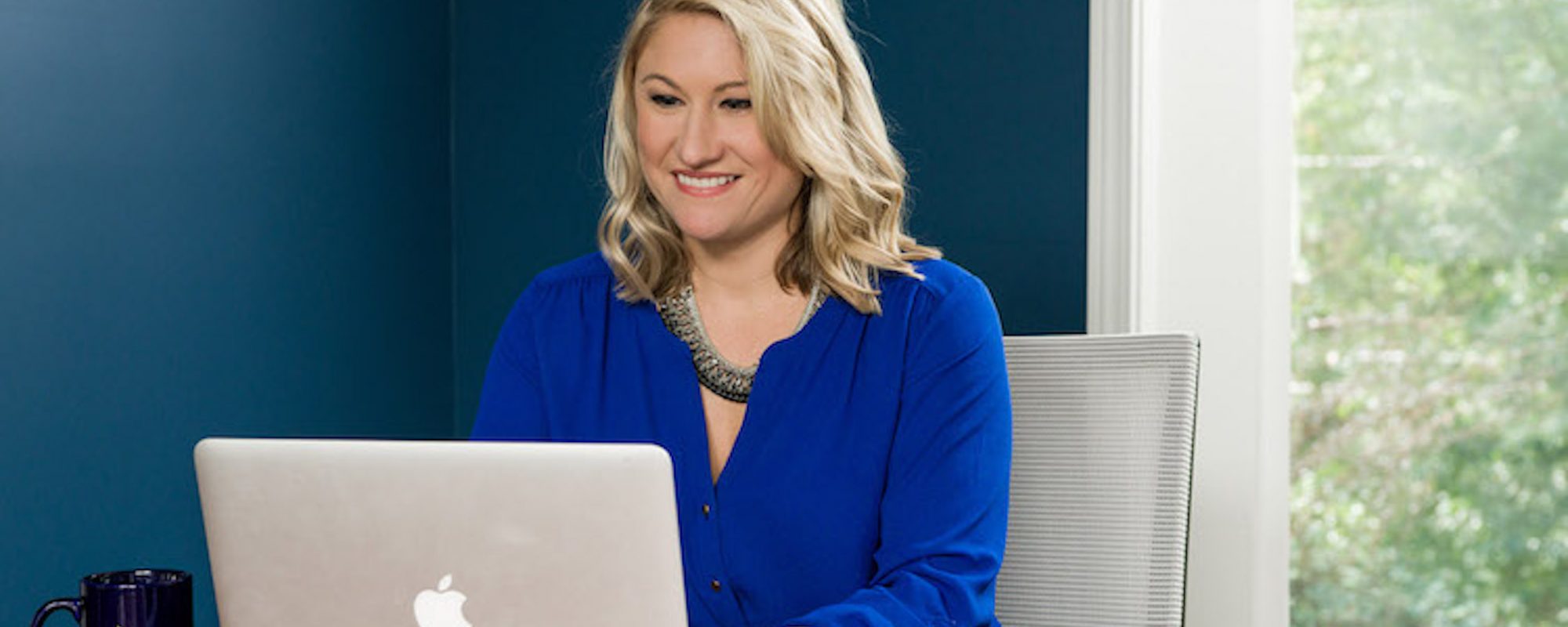 Online graduate student on laptop | Point University