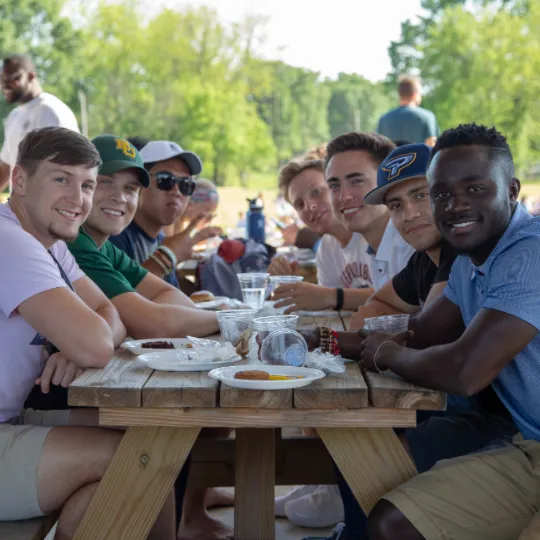 students at picnic table