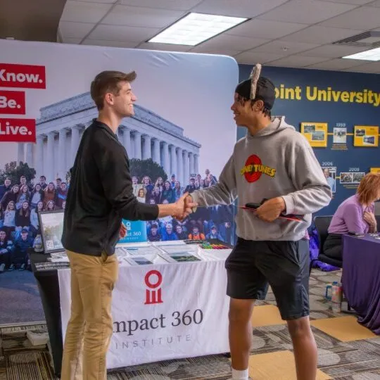 Career Fair Student with Recruit