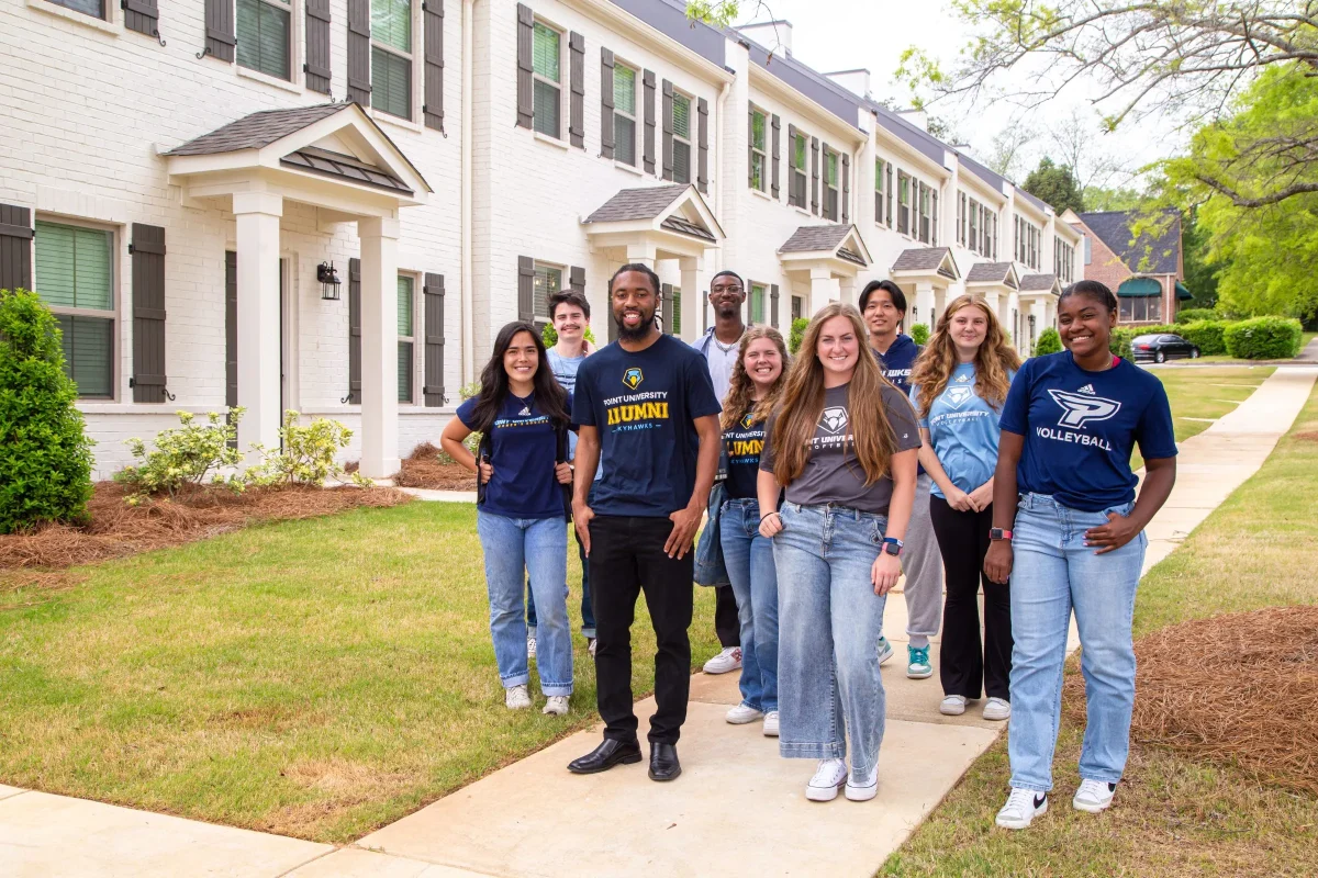Students standing infant of the Townhomes
