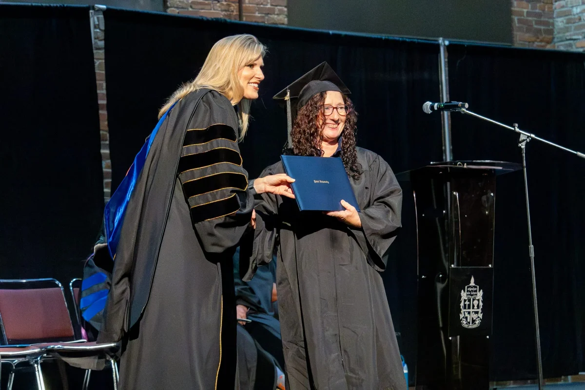 Students receiving diploma