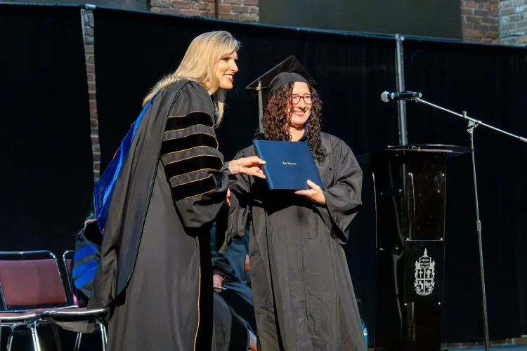 Students receiving diploma
