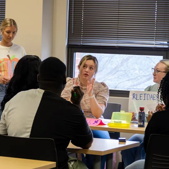 Students teaching in a classroom